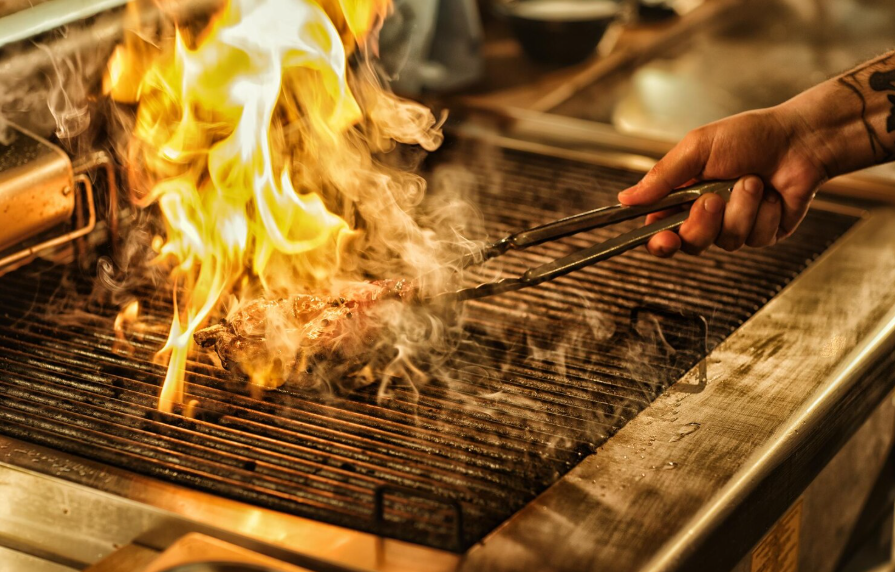 A tiny laptop in the palm of a hand