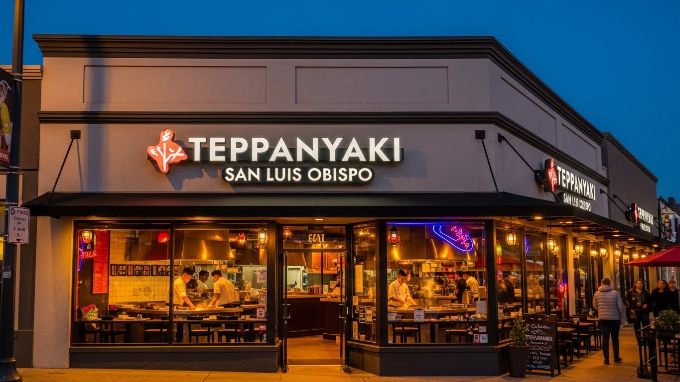 A tiny laptop in the palm of a hand