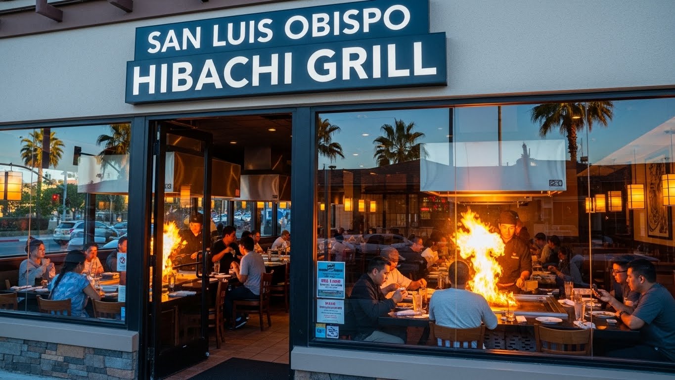 A tiny laptop in the palm of a hand