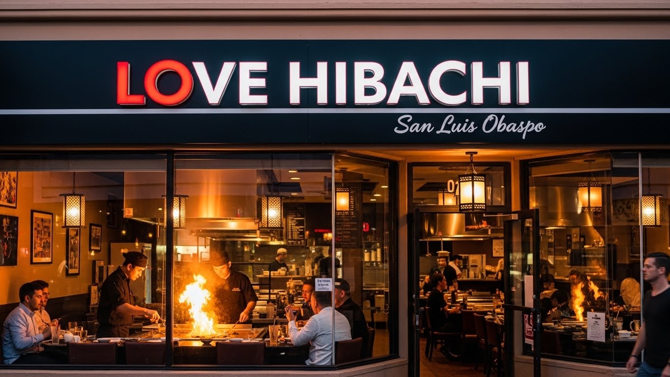 A tiny laptop in the palm of a hand