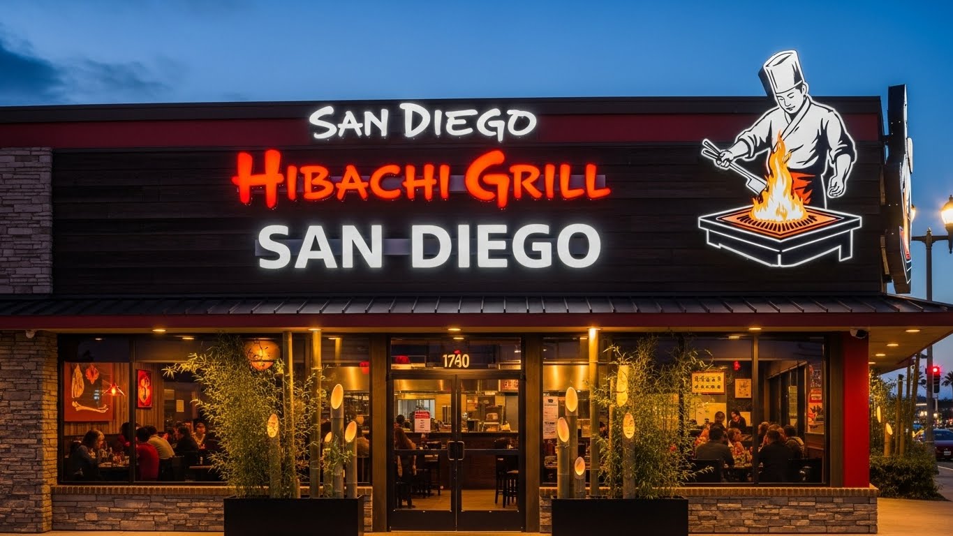 A tiny laptop in the palm of a hand